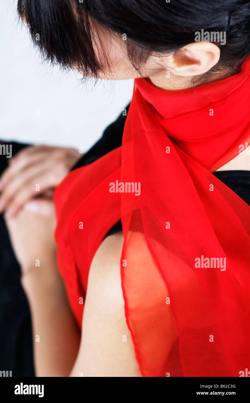Young woman wearing red Stock Photo