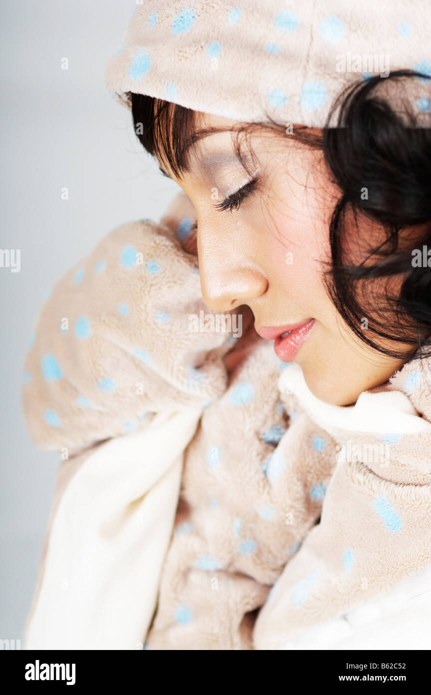 Young woman dressed in winter clothes Stock Photo