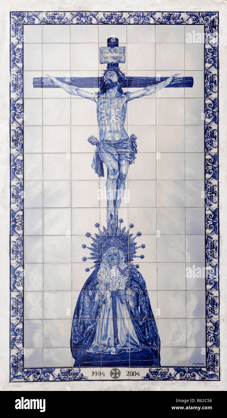 Image of St. Mary kneeling in front of crucified Christ on ornate