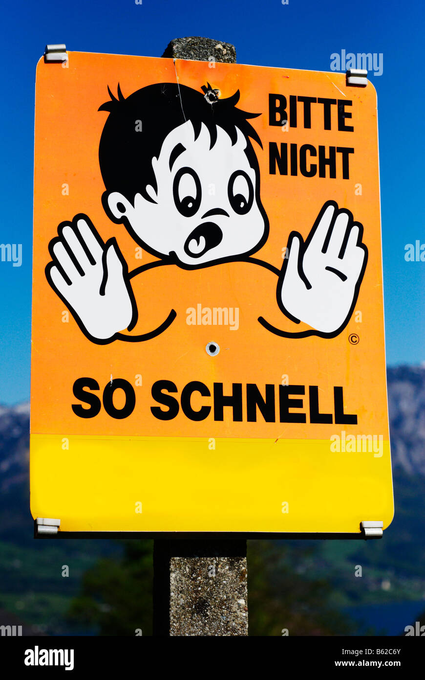 Sign bitte nicht so schnell, not so fast please Stock Photo