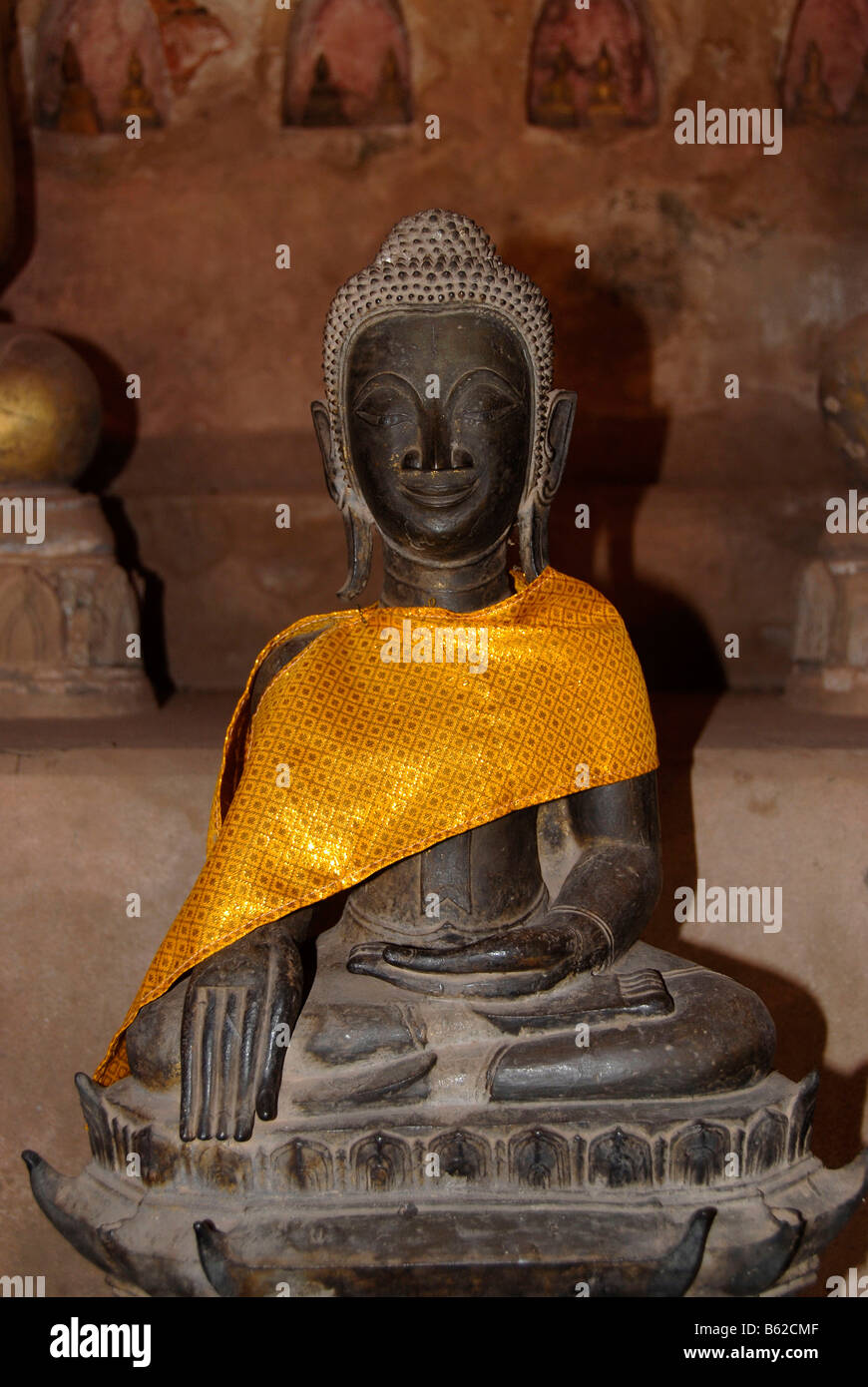 Sitting old bronze Buddha statue, Wat Sisaket, Vientiane, Laos, South East Asia Stock Photo