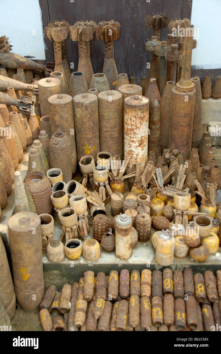 Collection of old rusty American bombs, dropped on Laos during the 2nd Indochina war by the US Airforce, Vietnam war, Phonsavan Stock Photo