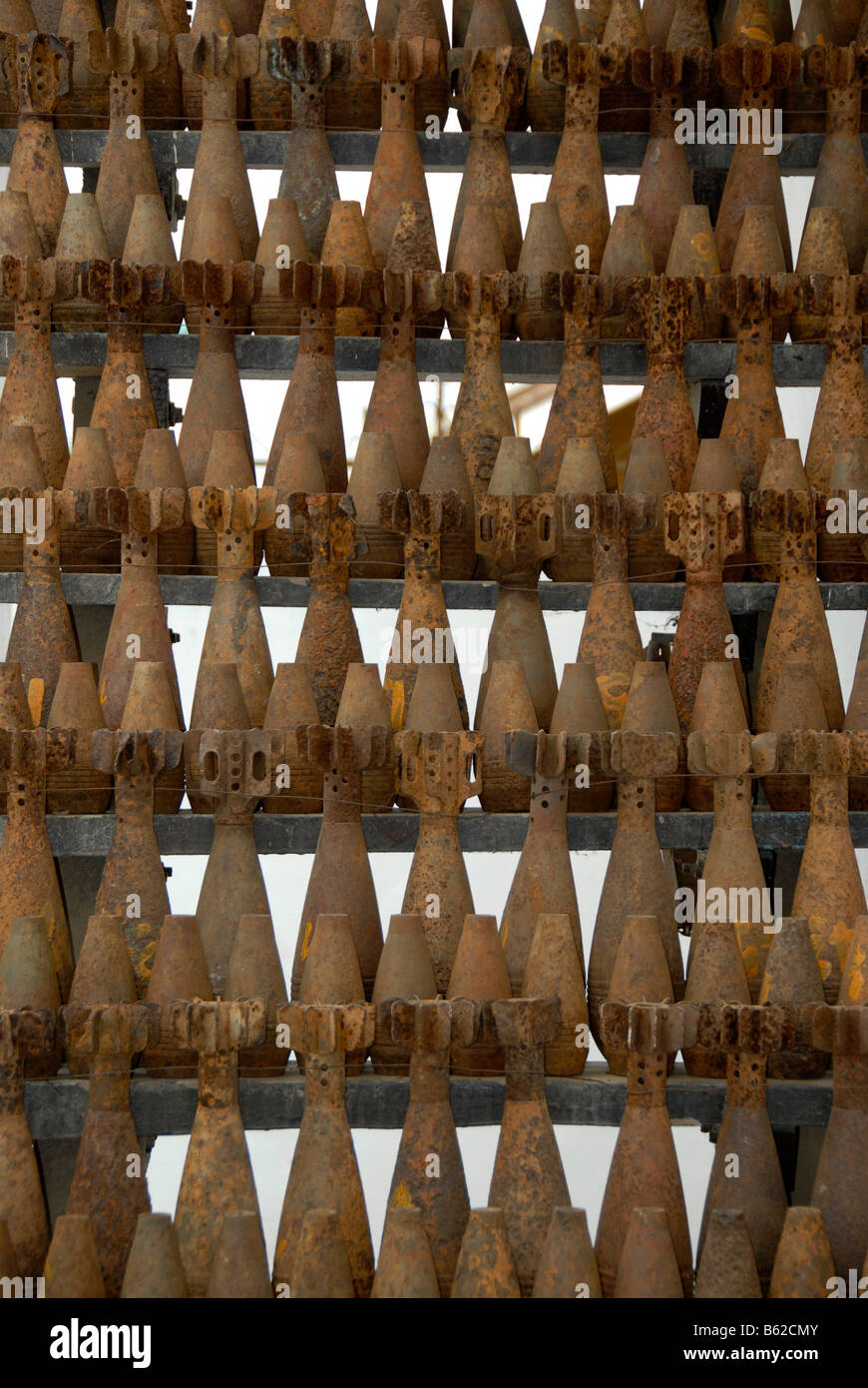 Collection of old rusty American bombs, dropped on Laos during the 2nd Indochina war by the US Airforce, Vietnam war, Phonsavan Stock Photo