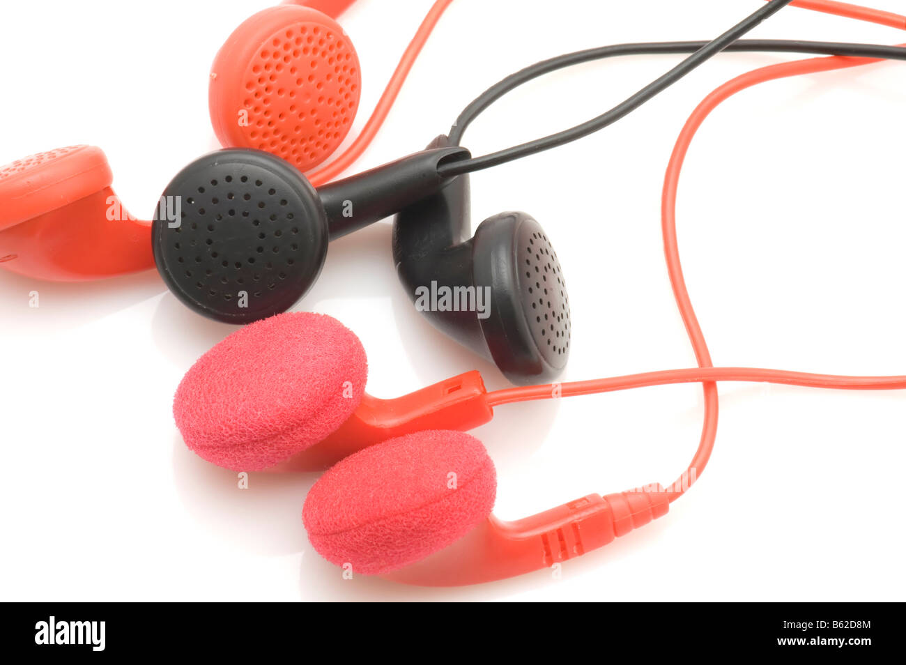 object on white tool Colored ear phones Stock Photo