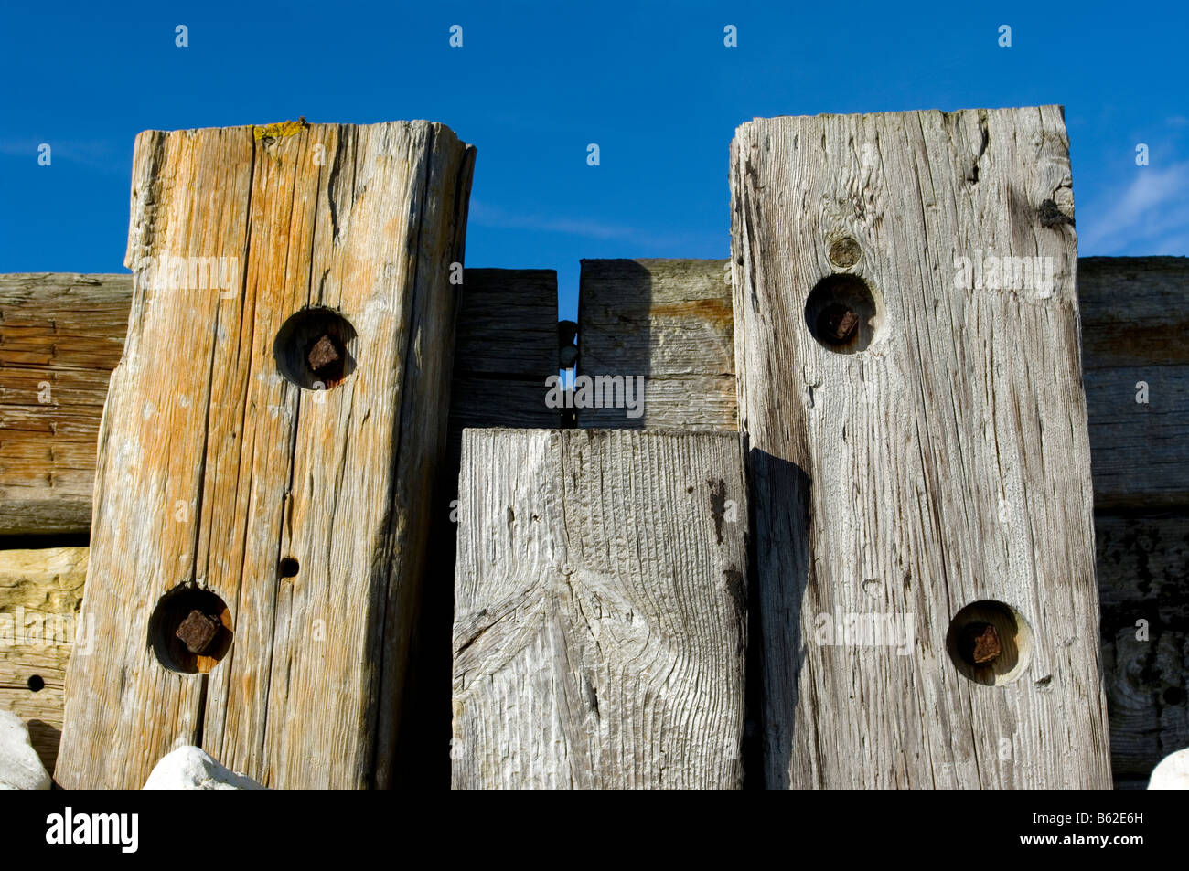 Abstract Wooden Riverside Harbour, Wooton Creek, Isle of Wight, England, UK, GB. Stock Photo