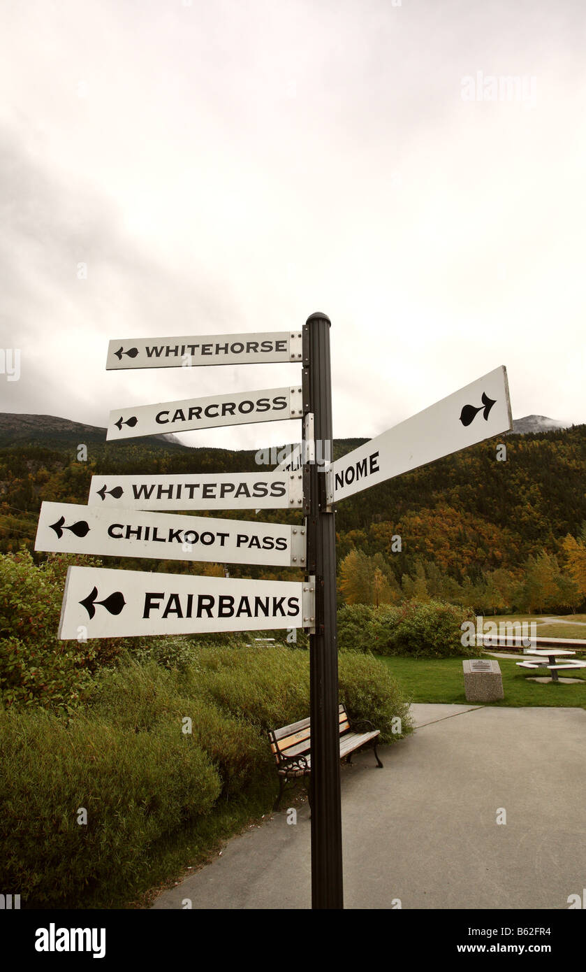 Direction sign post in Skagway Alaska Stock Photo Alamy
