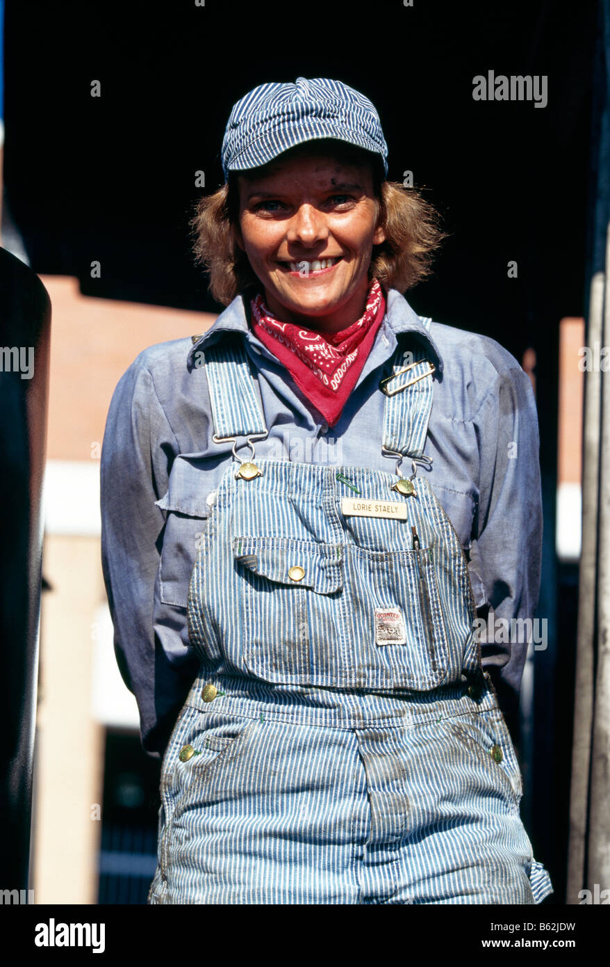 Female engineer poses on a at Steamtown National Historic Site, Scranton