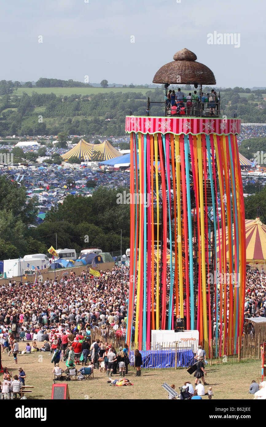 Glastonbury pop Festival June 2008 music fans gather in the Park area with  viewing tower platform showing whole site Stock Photo - Alamy