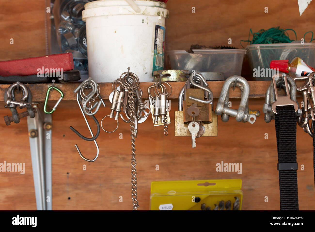 Assorted fixings hanging from a bench Stock Photo Alamy