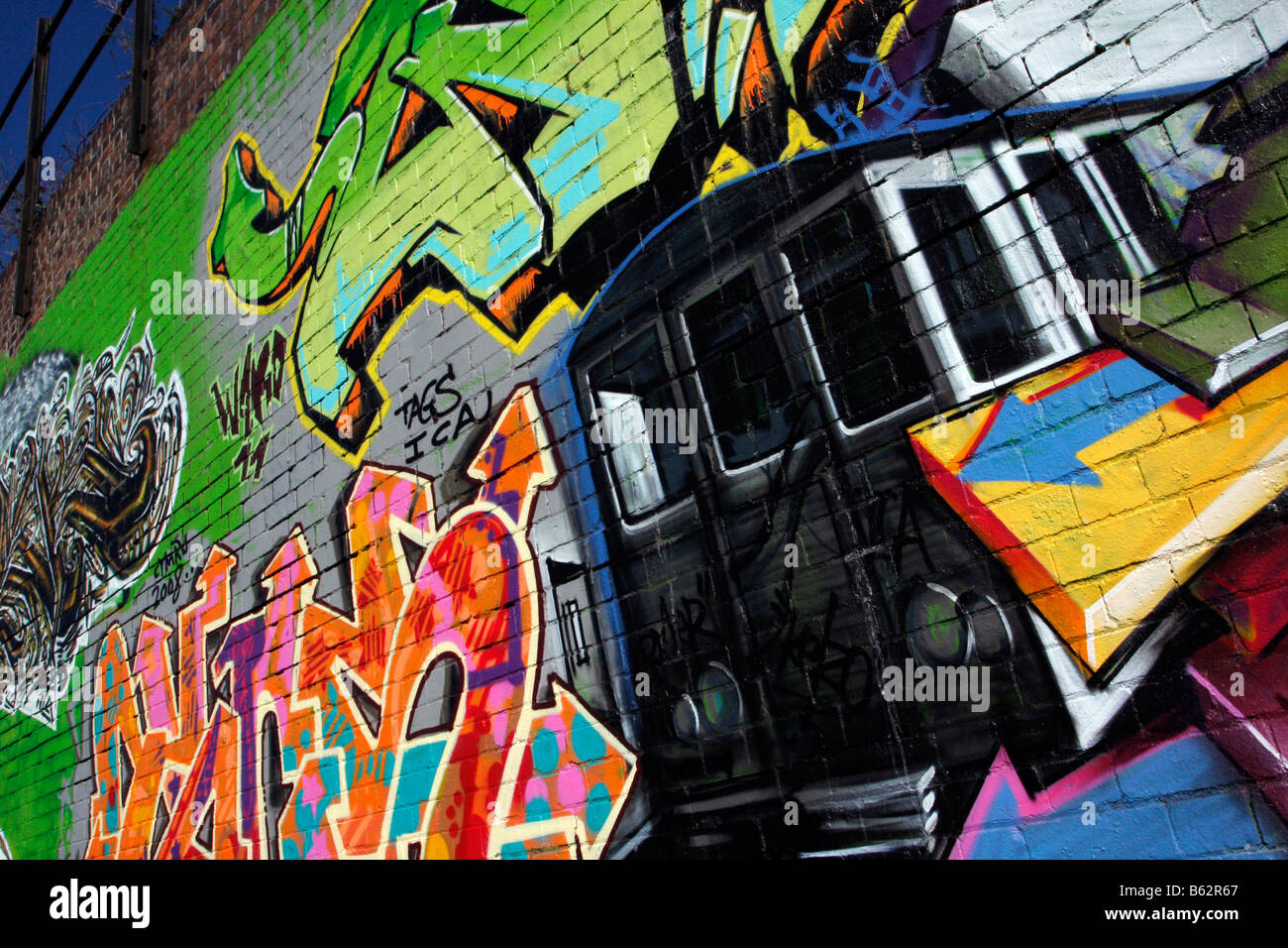 graffiti spray paint brick wall art painting train Stock Photo - Alamy