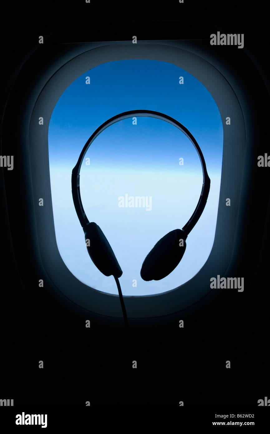 Silhouette of headphones in an airplane Stock Photo Alamy