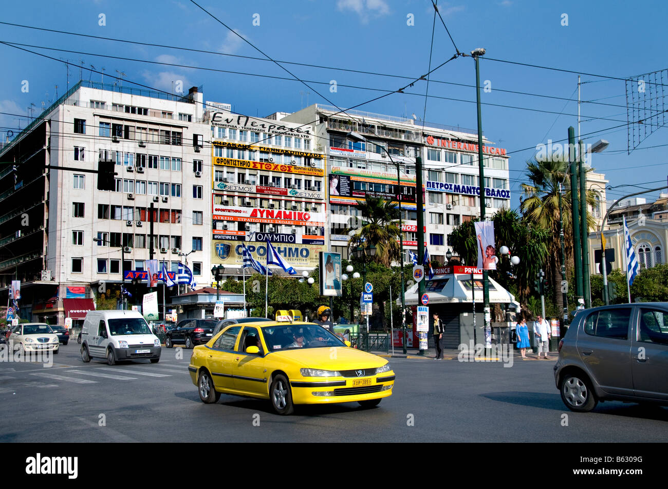 Piraeus yellow cap taxi Stock Photo