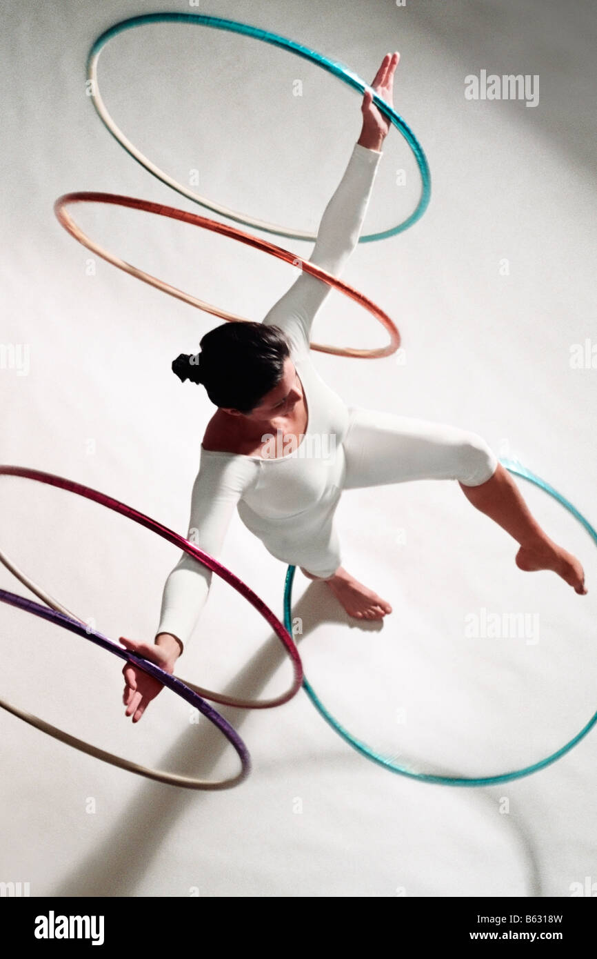 High angle view of a woman exercising with hula hoops Stock Photo