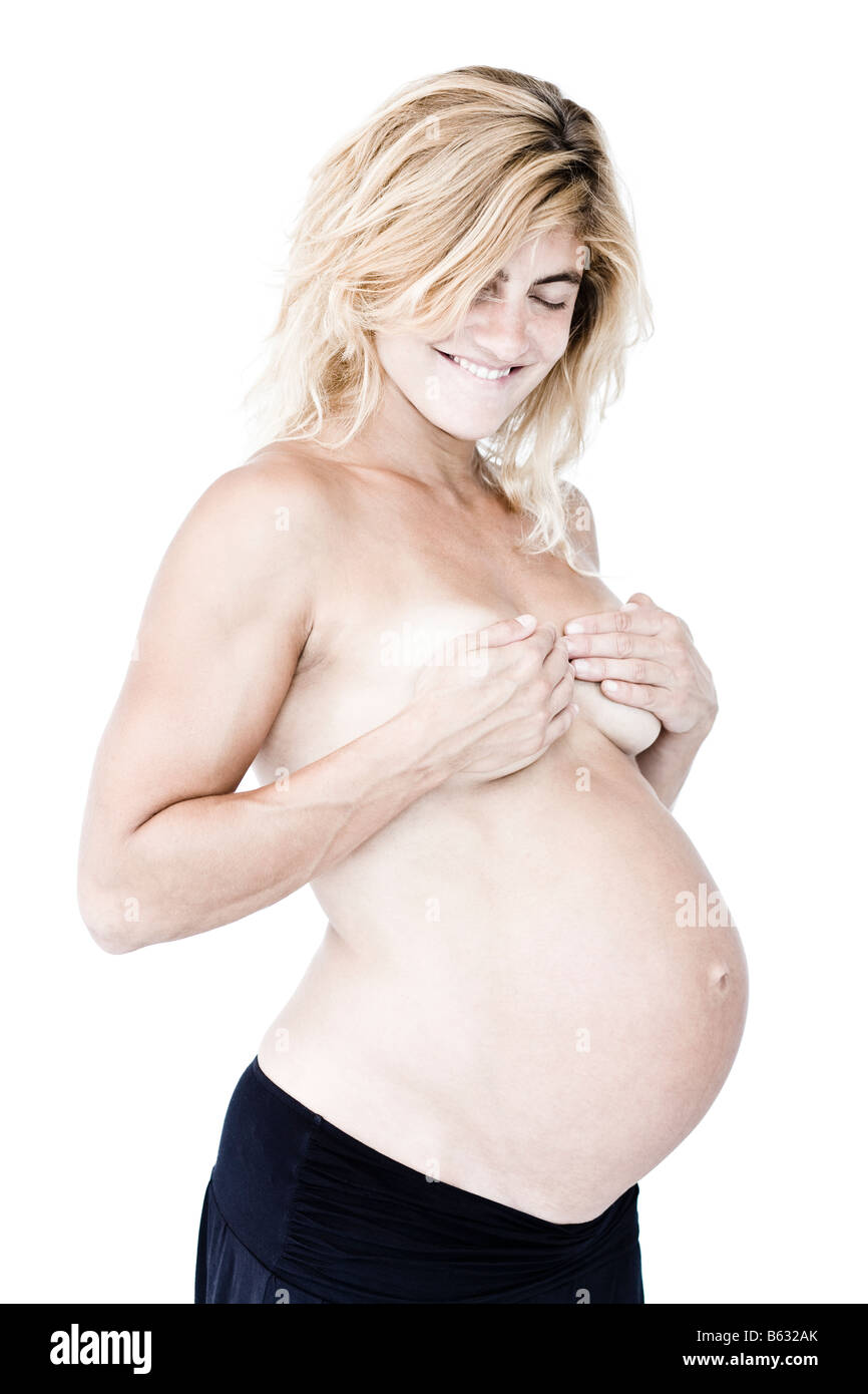 33 year old pregnant caucasian woman with the upper torso nude Stock Photo