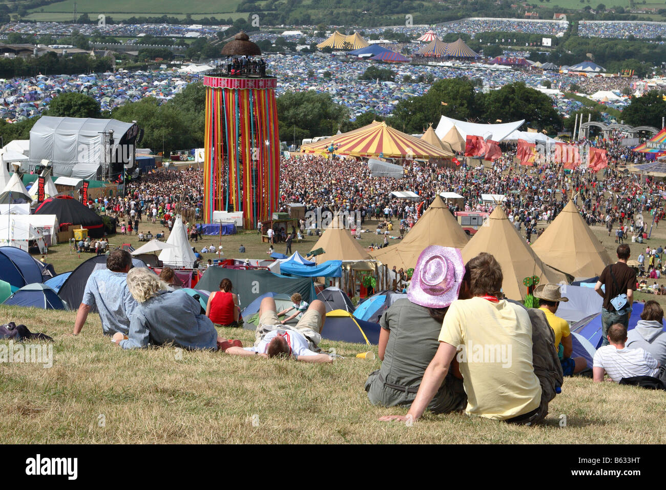 Glastonbury pop Festival June 2008 music fans gather in the Park area with a view across the whole festival site Stock Photo