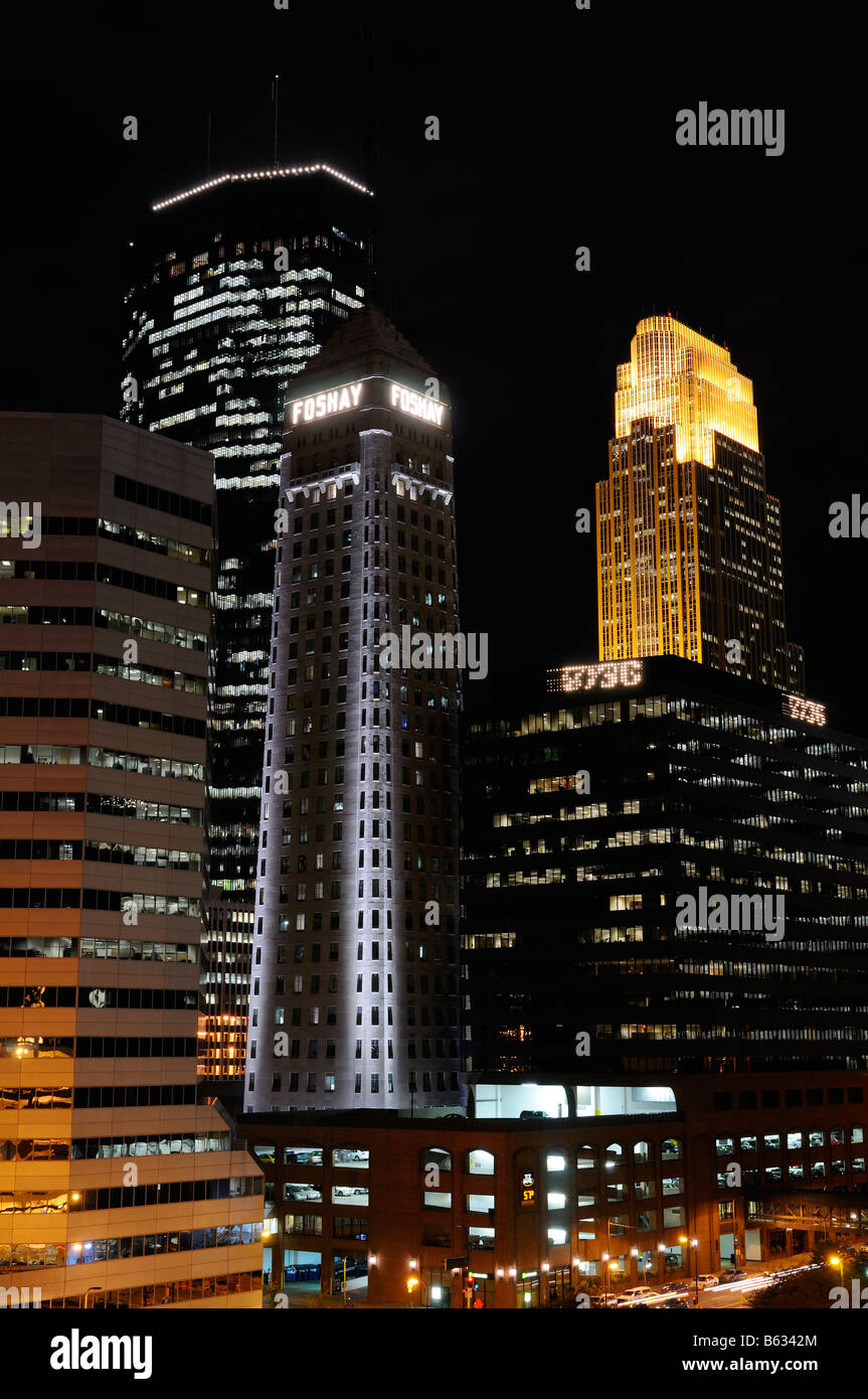 Downtown Minneapolis with lit financial center highrise office towers after dark Stock Photo