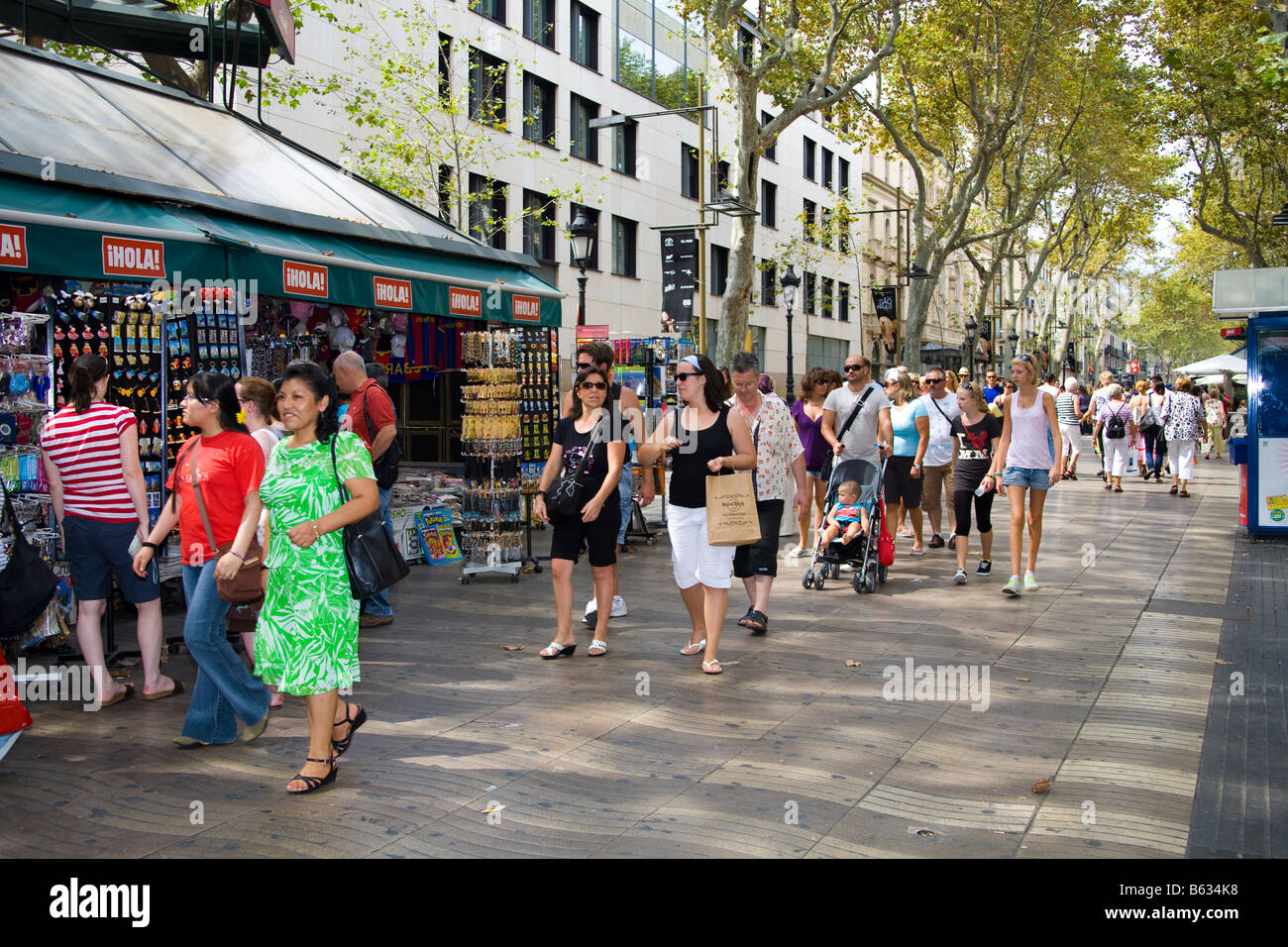 Tourists walking along La Rambla, Barcelona, Spain Stock Photo