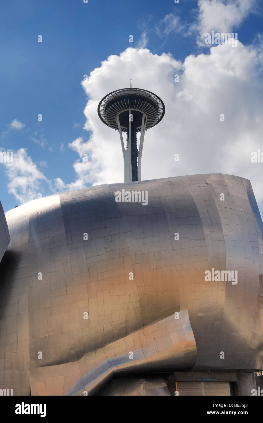 The Seattle Space Needle with the Musical Experience Project building