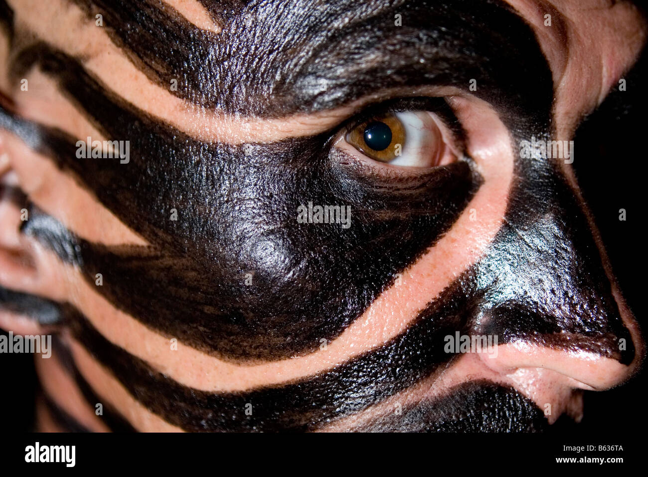 Portrait of a mid adult man with face paint Stock Photo - Alamy