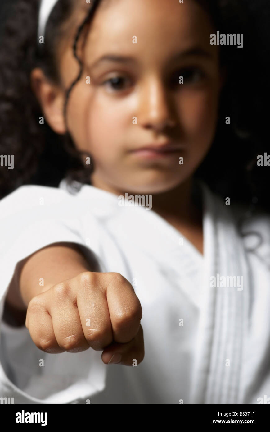 Portrait of a girl practicing karate Stock Photo Alamy