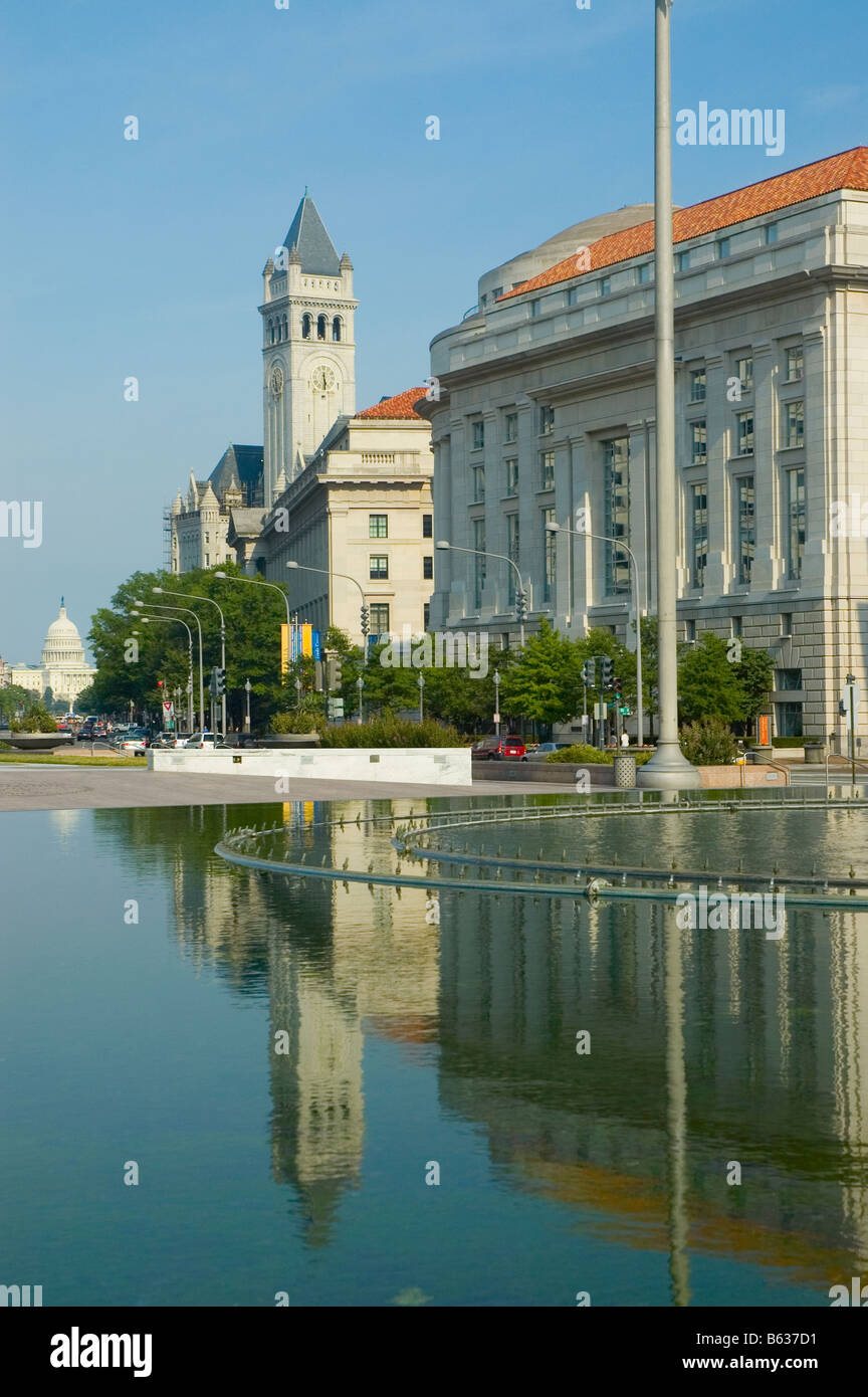 Reflection of a building in water, Old Post Office Building, Pennsylvania Avenue, Washington DC, USA Stock Photo