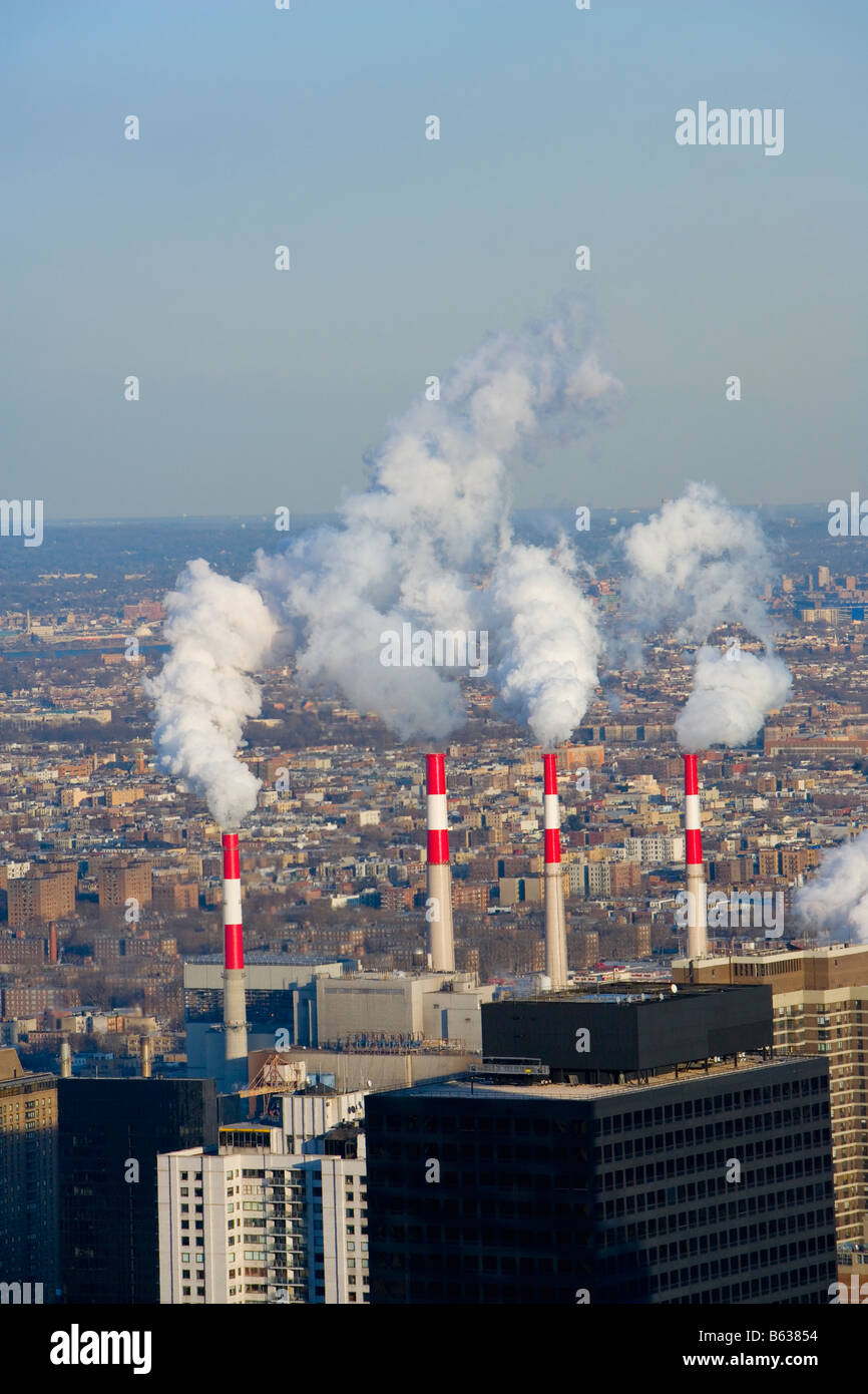 Aerial view of smoke emerging from smoke stacks of a factory, Manhattan, New York City, New York State, USA Stock Photo