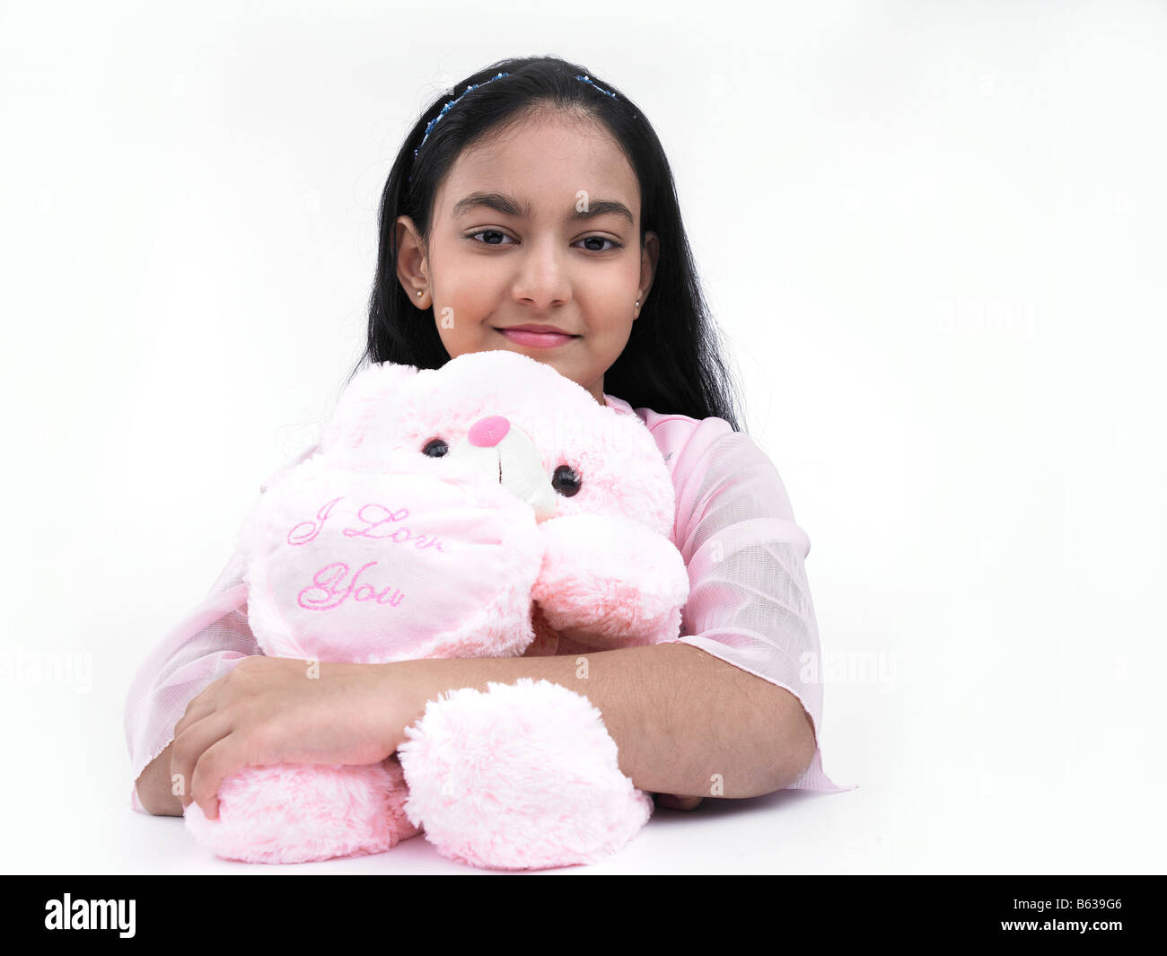 Portrait Of An Asian Teenage Girl Of Indian Origin With Her Teddy Bear Stock Photo Alamy