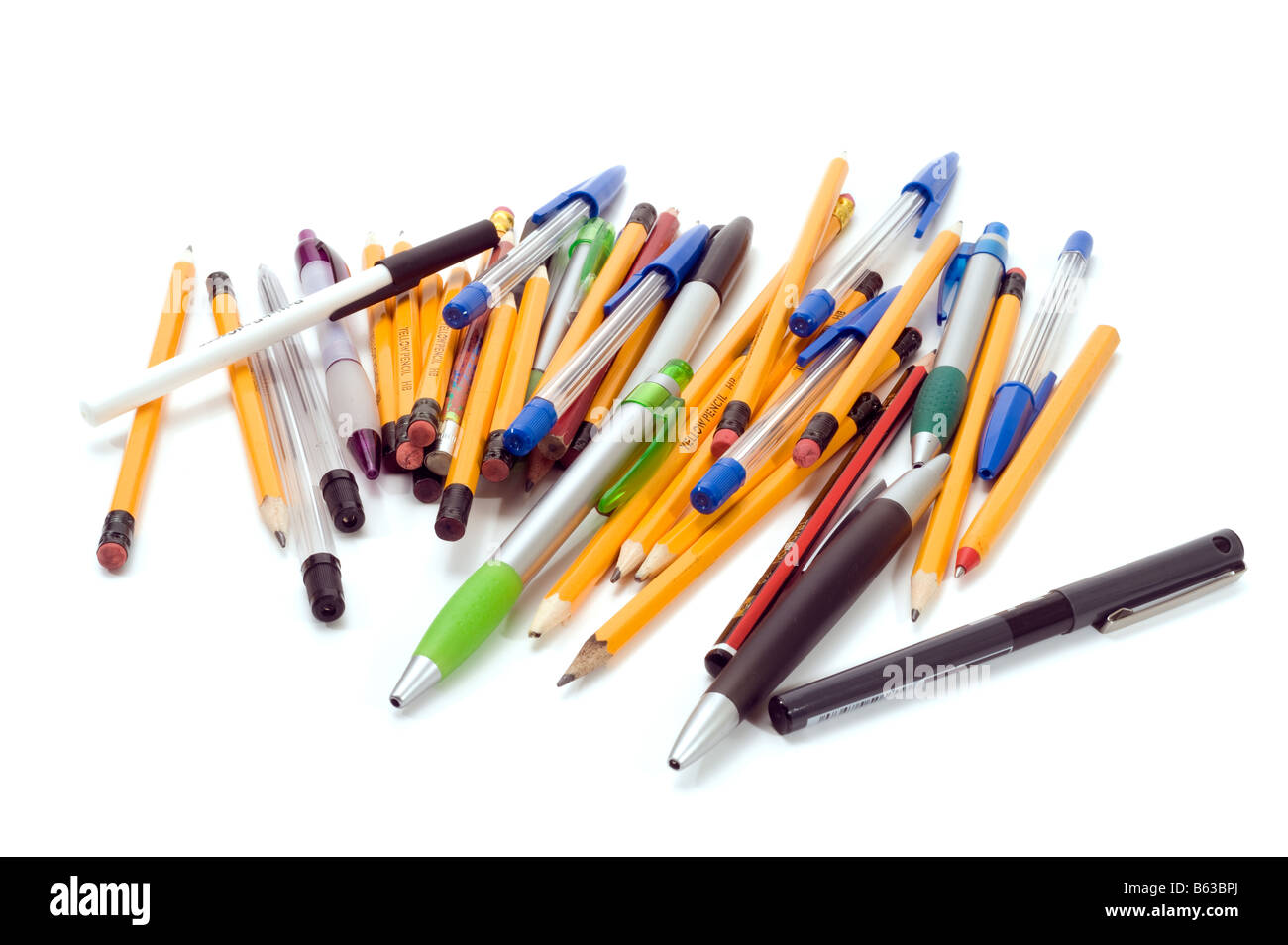 pile of mixed pencils and pens Stock Photo