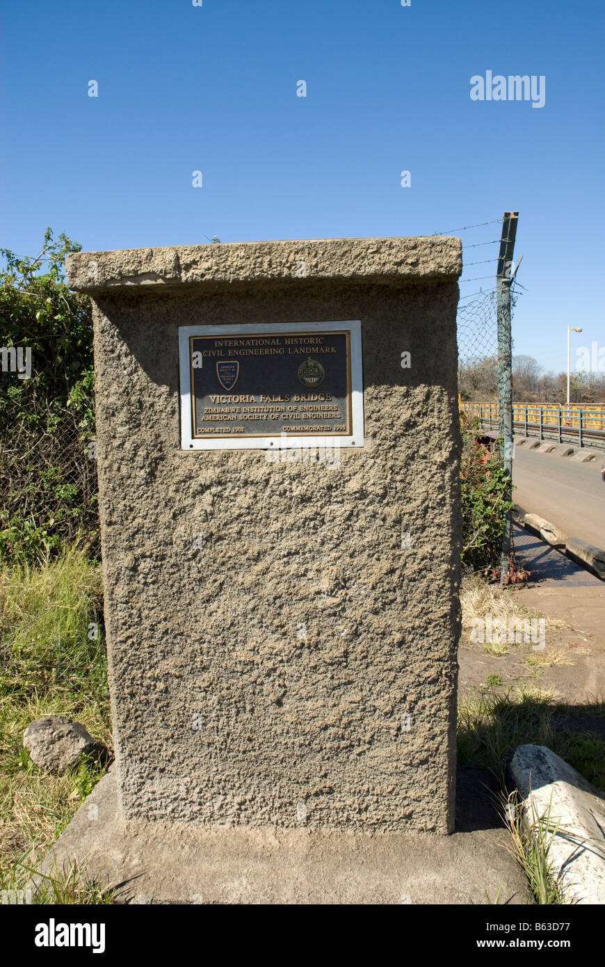 Official monument marking the Victoria Falls Bridge the crossing from Zimbabwe to Zambia Stock Photo