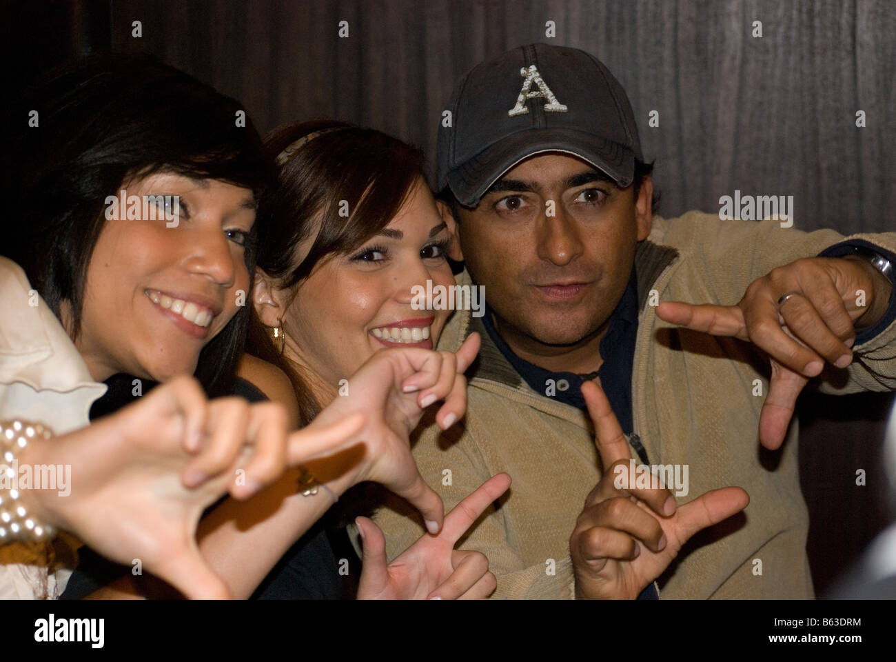 Adal Ramones with a group of fans Stock Photo