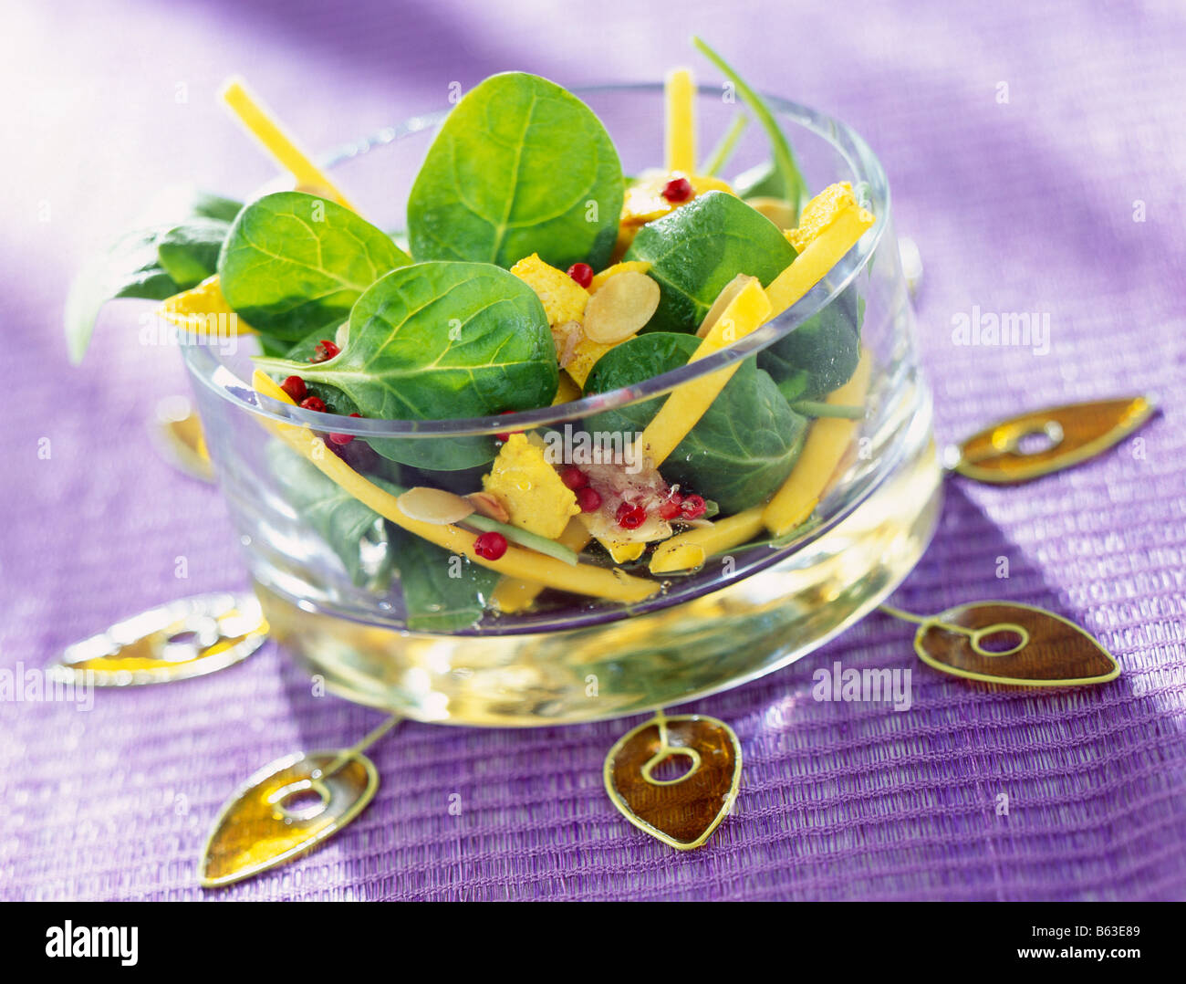spinach shoots with strips of chicken Stock Photo