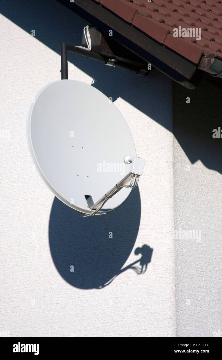 TV satellite dish on a house Stock Photo Alamy