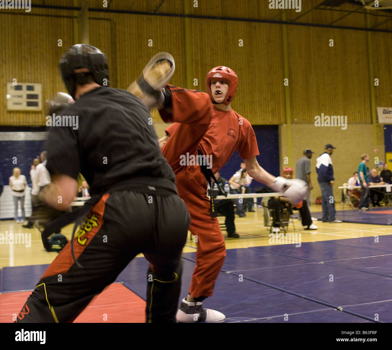 Competitive Fight Competitors fighting in a kung fu tournament Stock Photo - Alamy