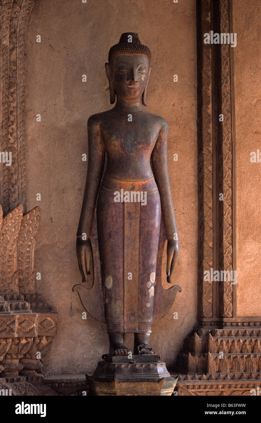 Standing Buddha statue in Haw Pha Kaew museum, formerly the Royal temple Wat Pha Kaew, in Vientiane, Laos Stock Photo