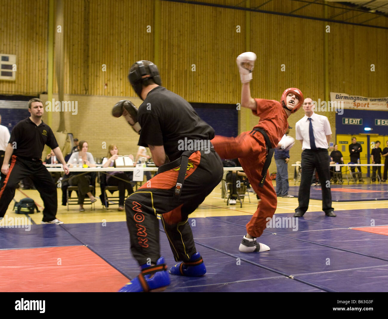 Competitive Fight Competitors fighting in a kung fu tournament Stock Photo - Alamy