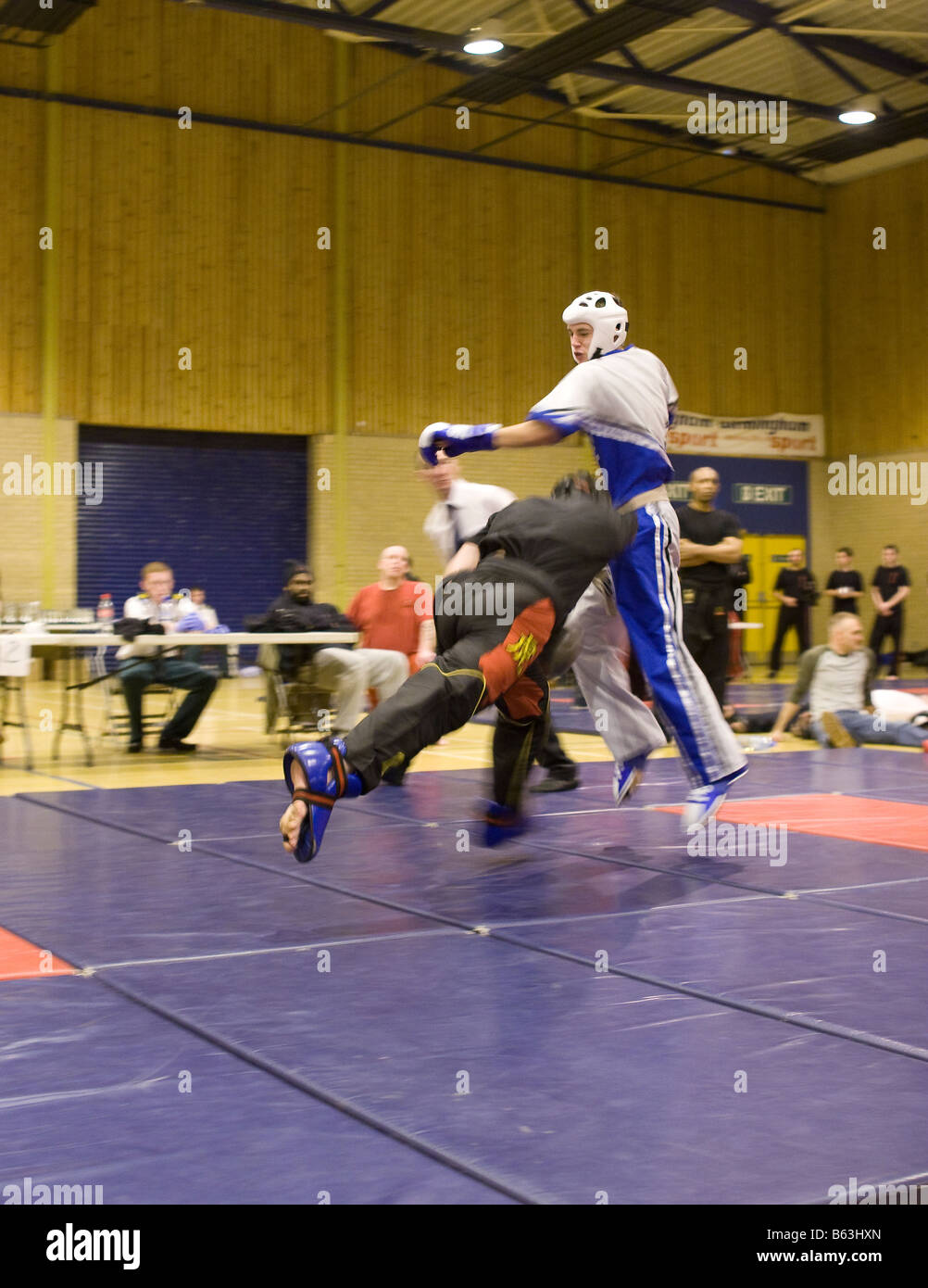 Competitors fighting in a kung fu tournament Stock Photo Alamy