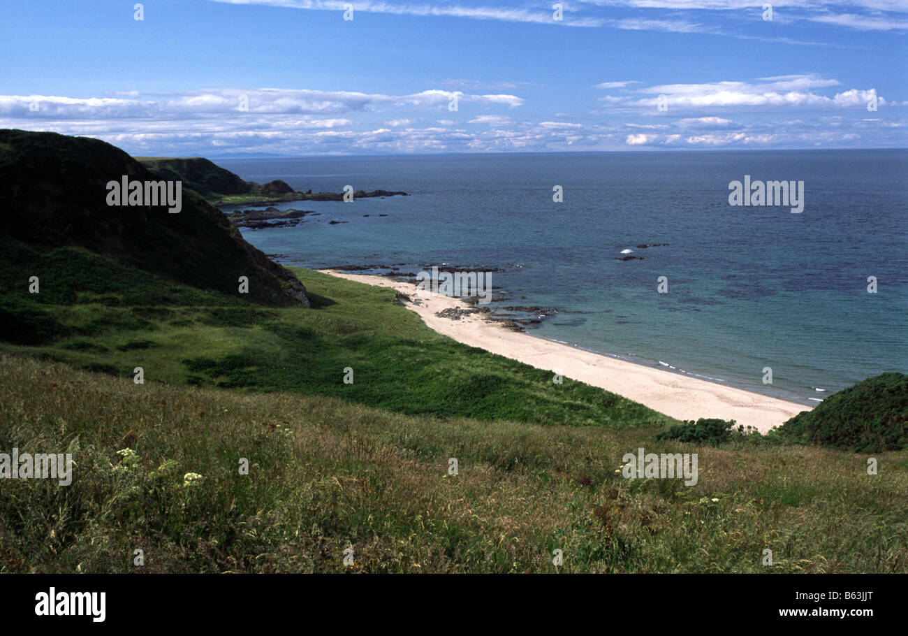 Fine white sands of deserted Sunnyside Beach on the coastal walking route near Cullen Moray Firth Scotland Stock Photo