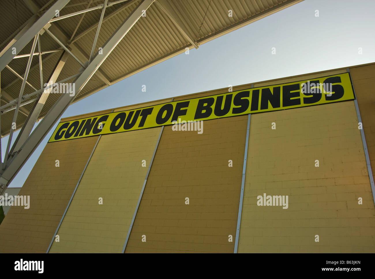 Going out of business sign on a building/store. Stock Photo