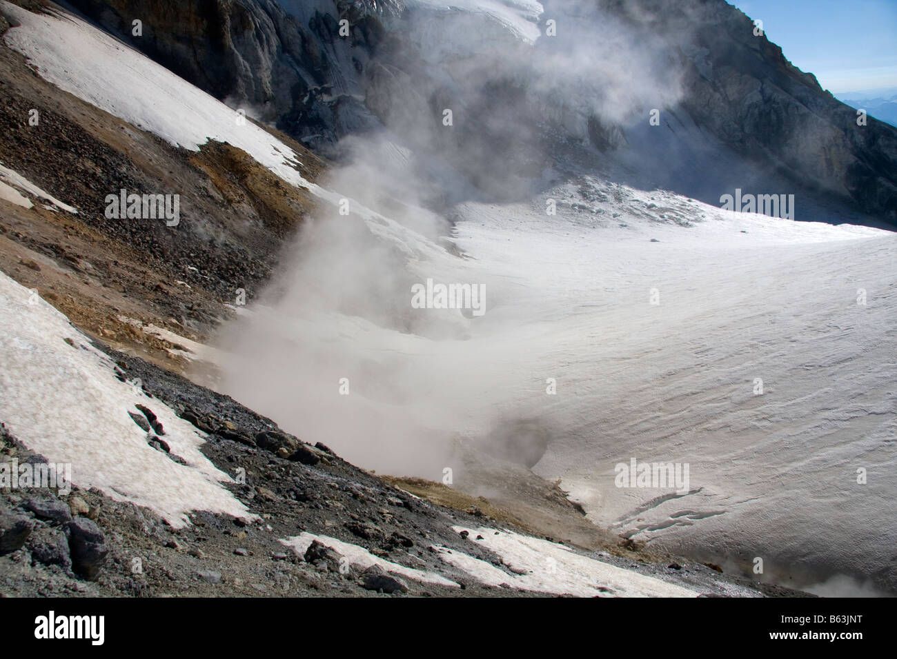 Steam escapes from the summit crater of Mount Baker in the Mount Baker Wilderness North Cascades Washington Stock Photo