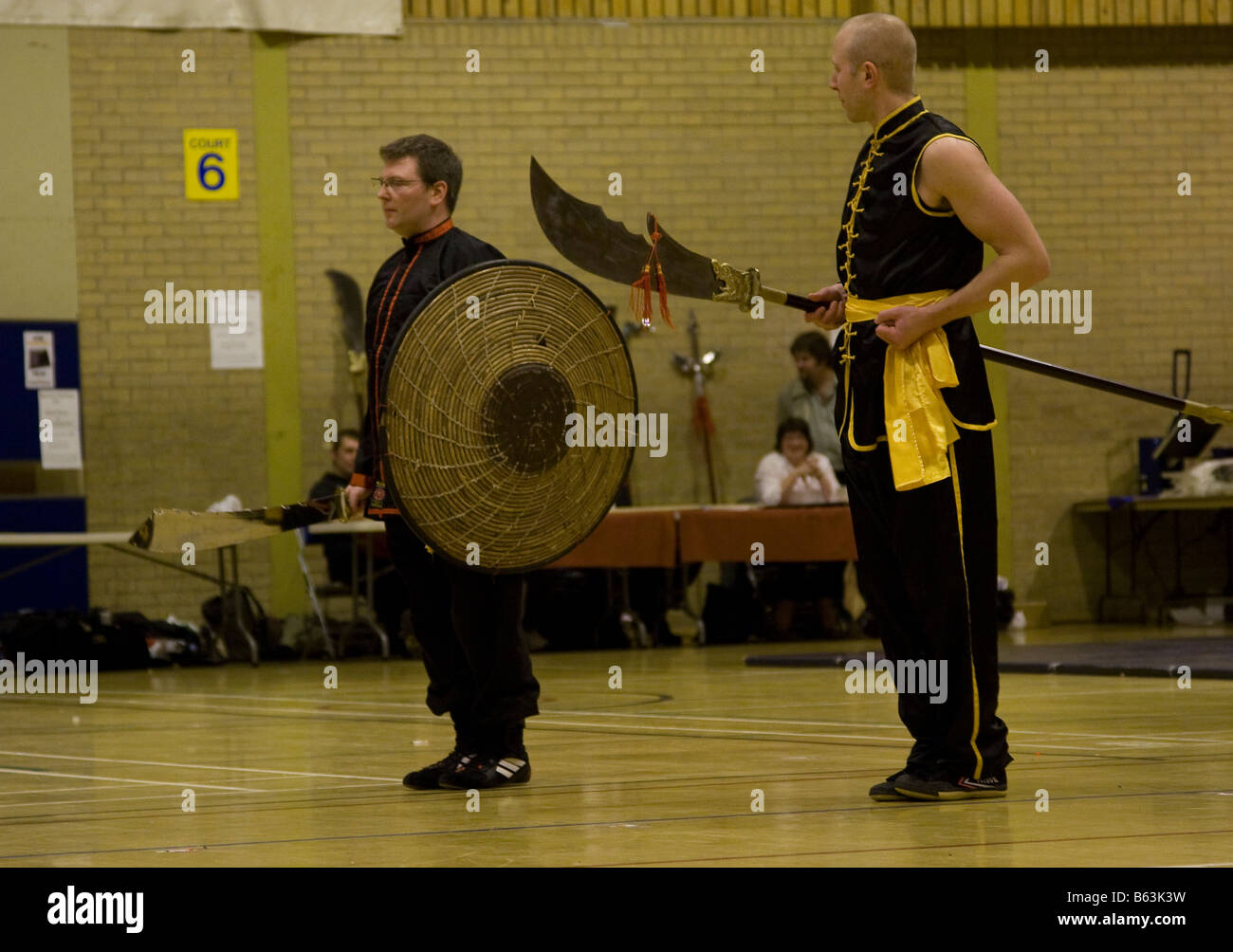 Two martial artists in a kung fu demonstration Stock Photo - Alamy