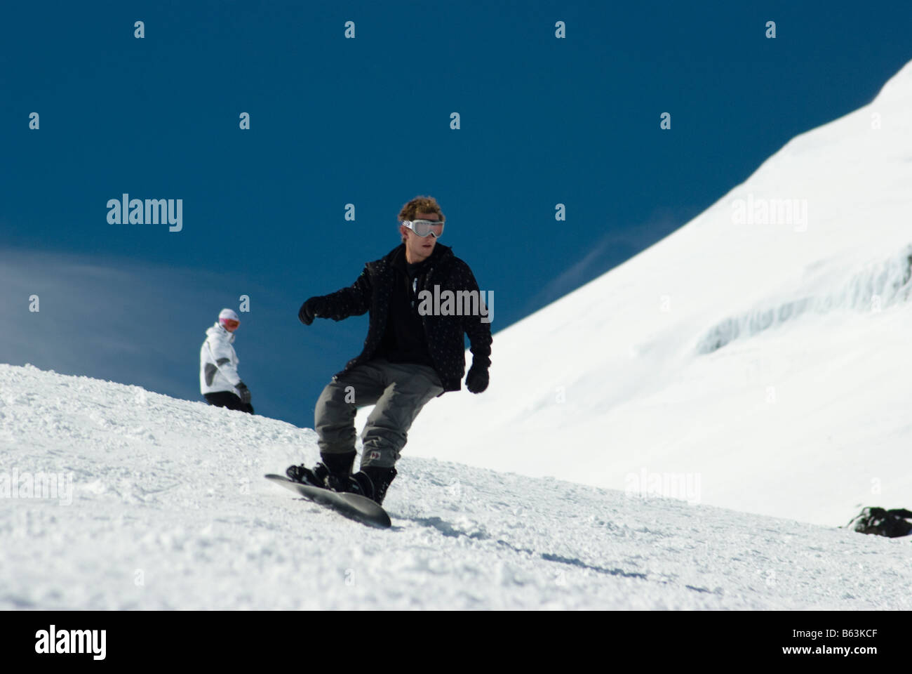 Yong snowboarder at Turoa ski fields, Ruapehu, New Zealand Stock Photo