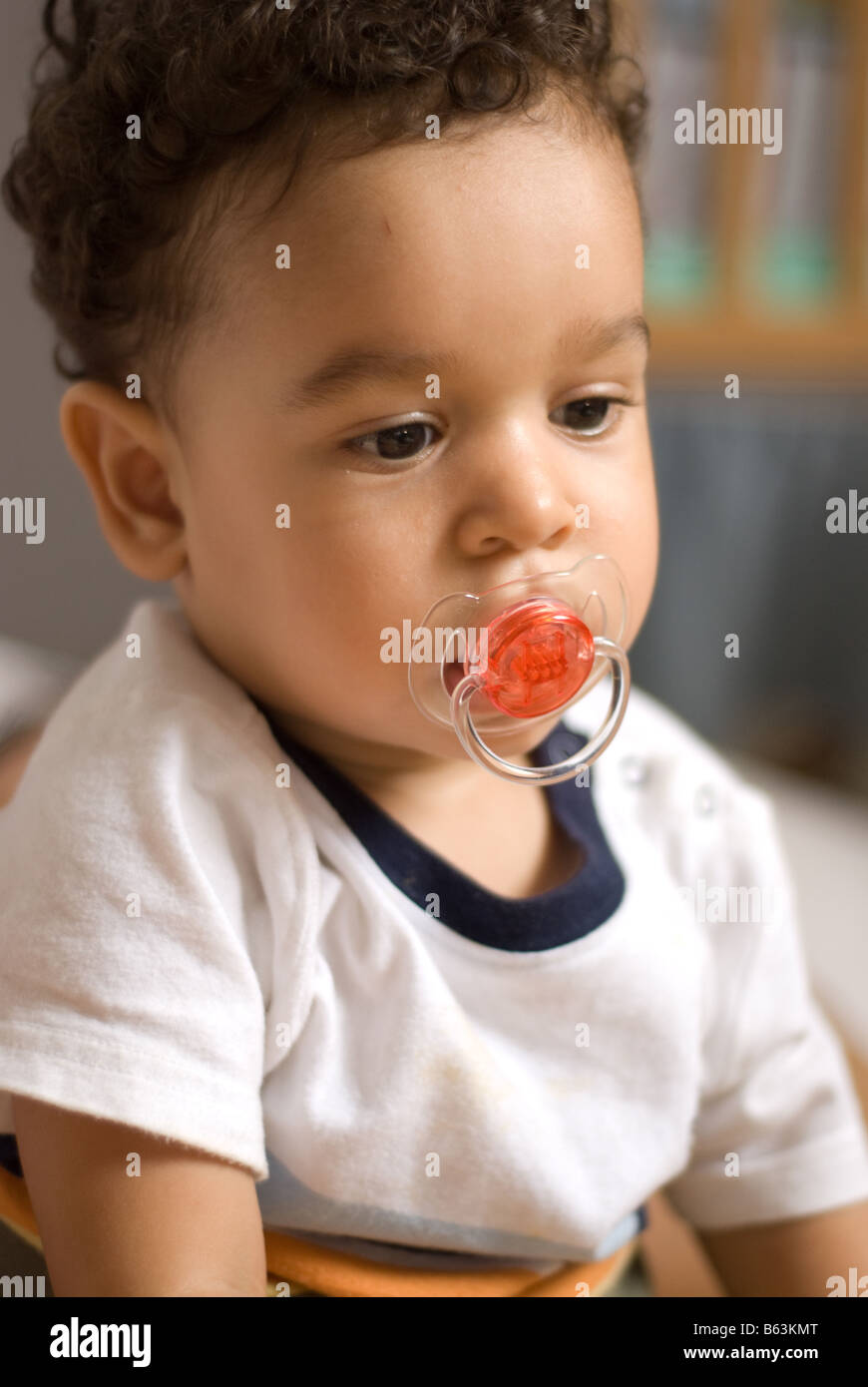 A portrait of a toddler with his pacifier Stock Photo Alamy