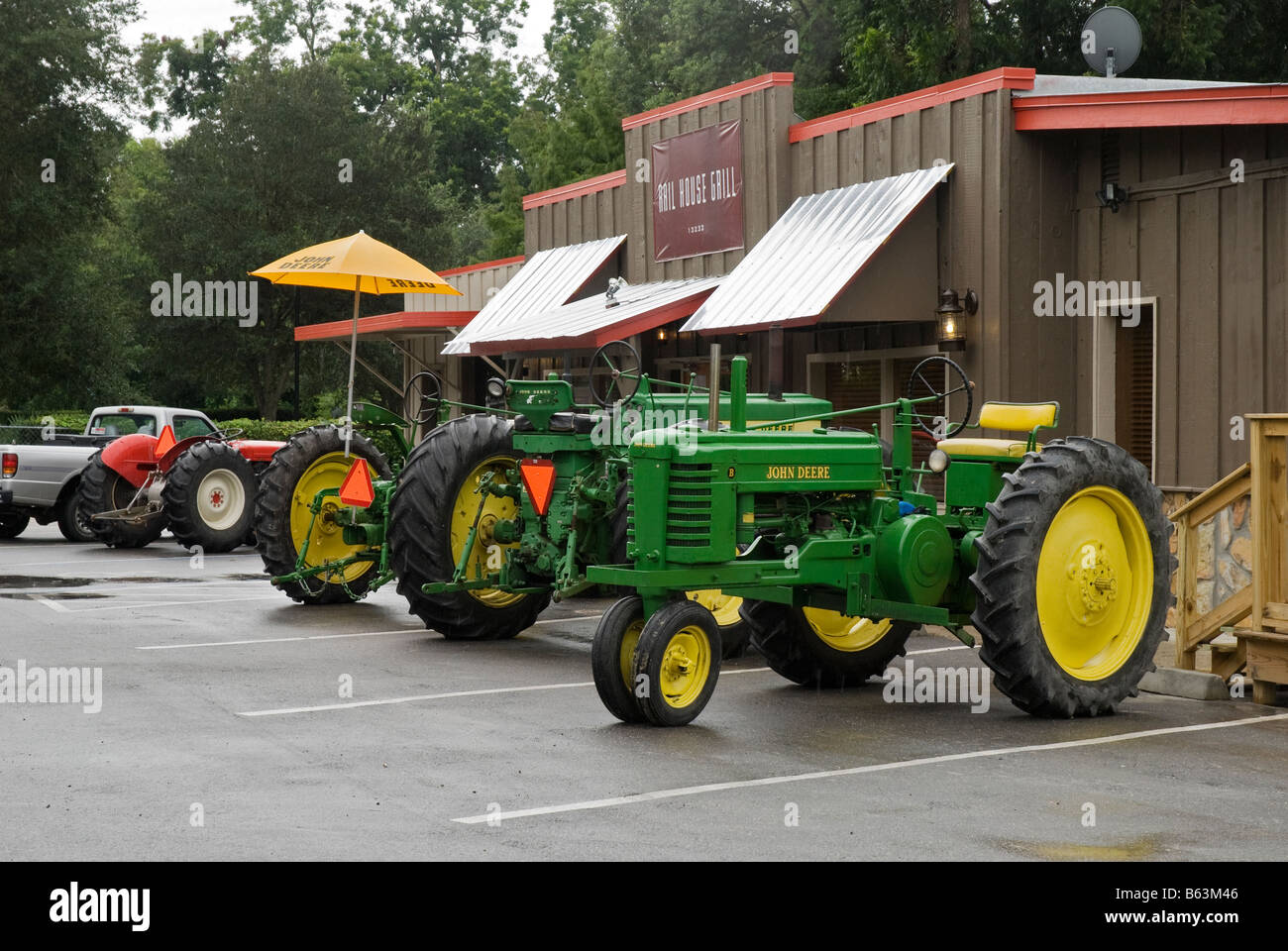 antique tractors arrive at the Rail House Grill Archer Florida Stock Photo