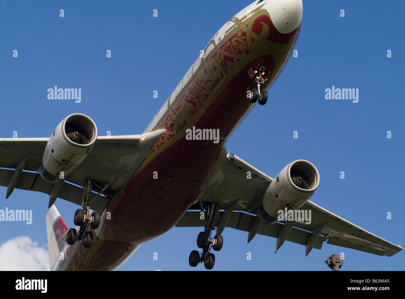 A Jetplane on a final approach to London Heathrow Airport Stock Photo