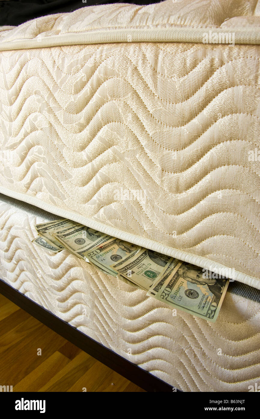 Hiding money under mattress hires stock photography and images Alamy