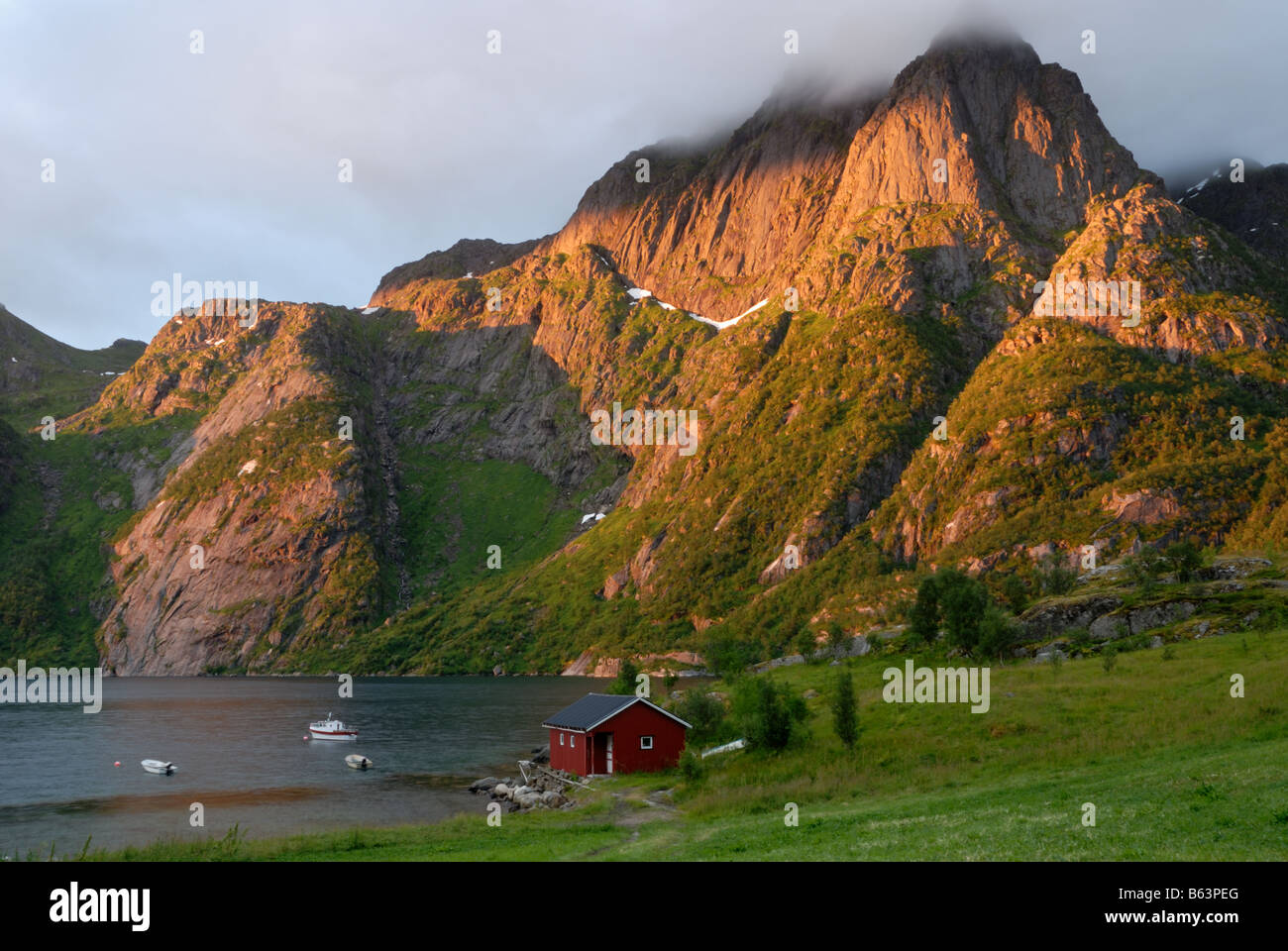 Sunrise over a fjord in the Lofoten Islands of Norway Stock Photo - Alamy