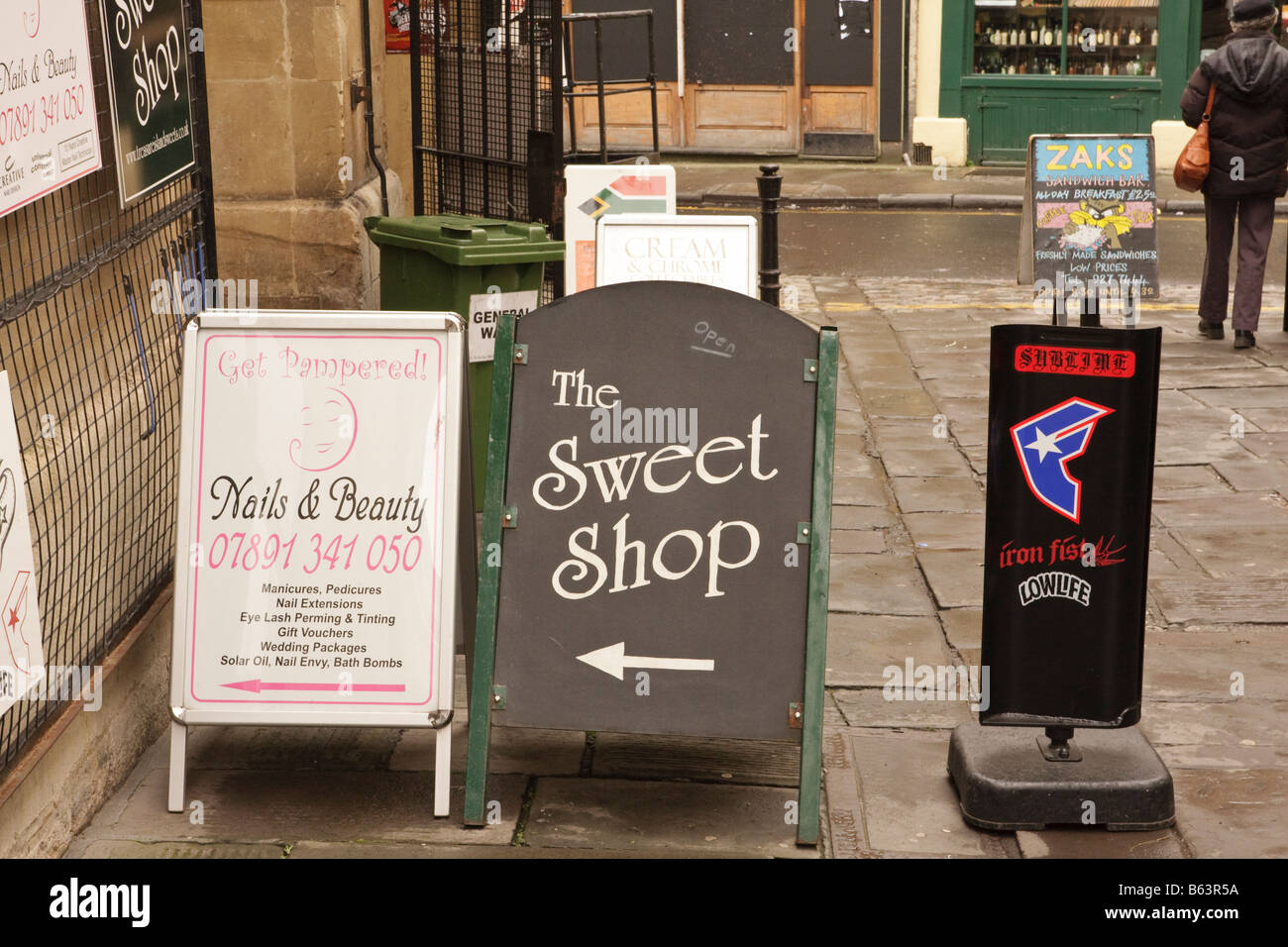 Shop Advertising Signs in the Indoor Market Bristol Stock Photo Alamy