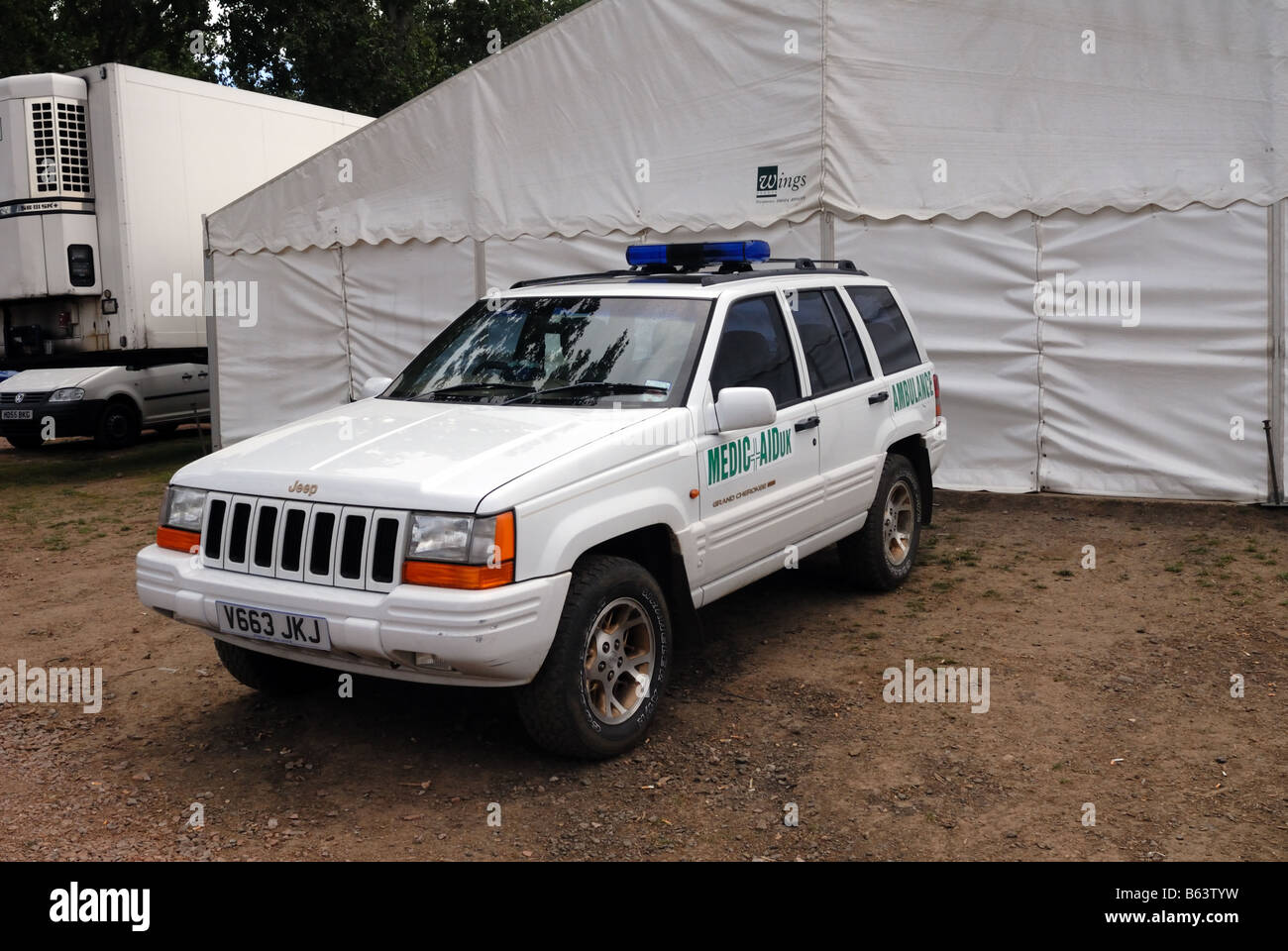 White Chrysler Jeep Grand Cherokee Limited used as an ambulance Registration Number V663 JKJ Medic Aiduk 4WD four wheel drive Stock Photo
