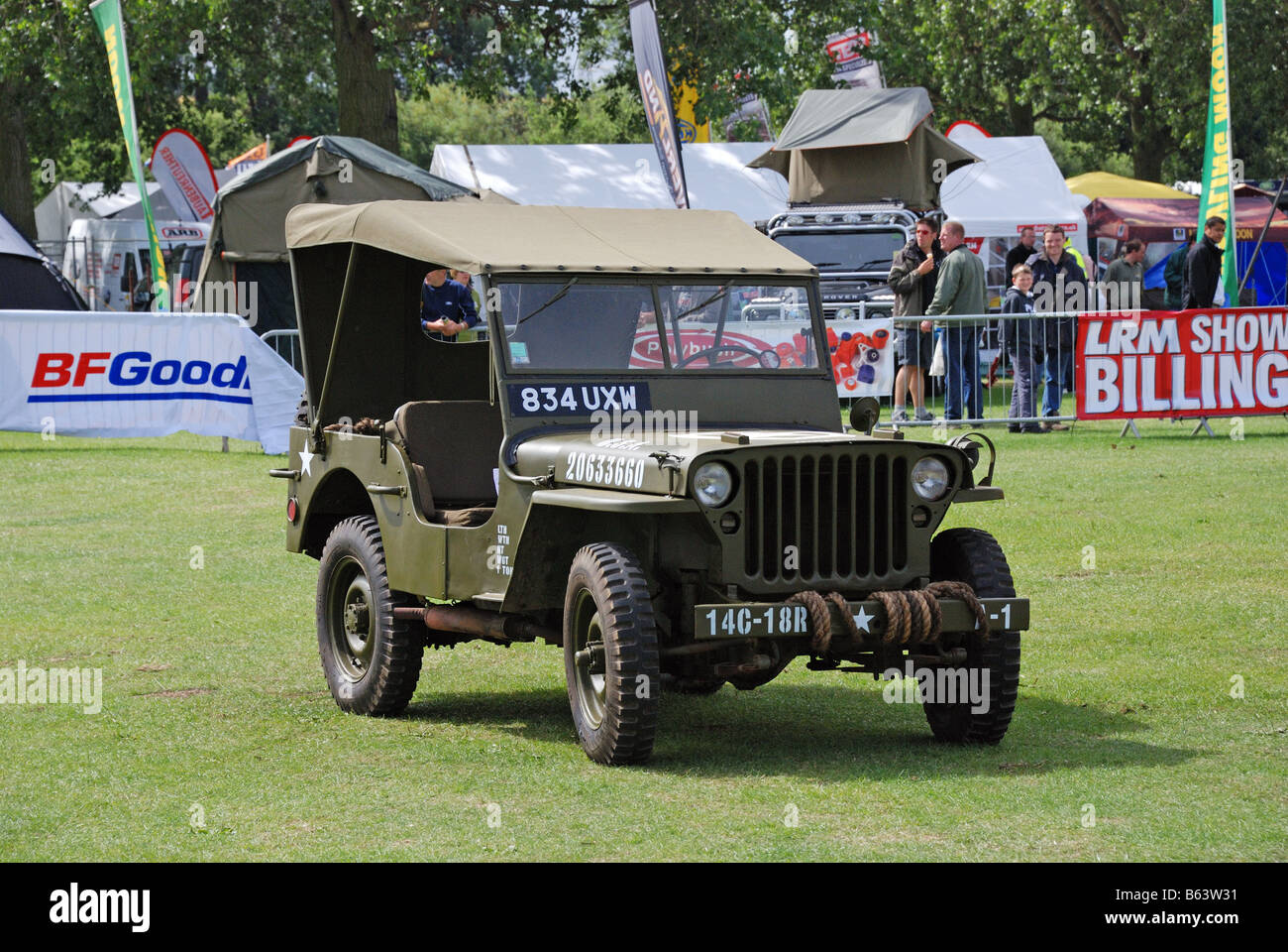World War II issue 1 Ton Jeep in the arena Registration number 834 UXW number 20633660 number on bumper 14C 18R 4WD four wheel Stock Photo