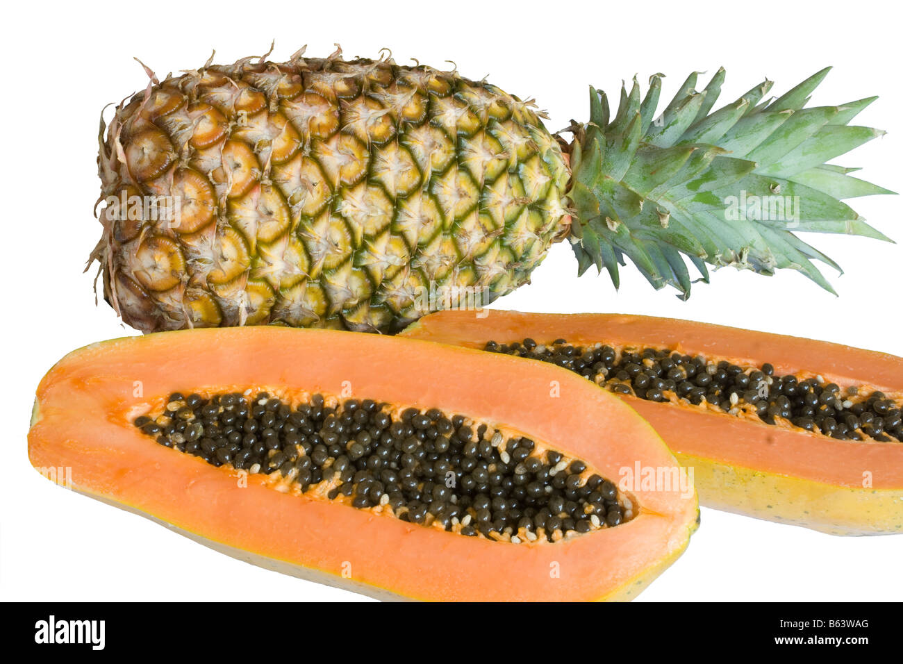 Papaya and pineapple on white background Stock Photo Alamy